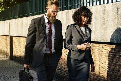 Sales CRM requirements - two office workers